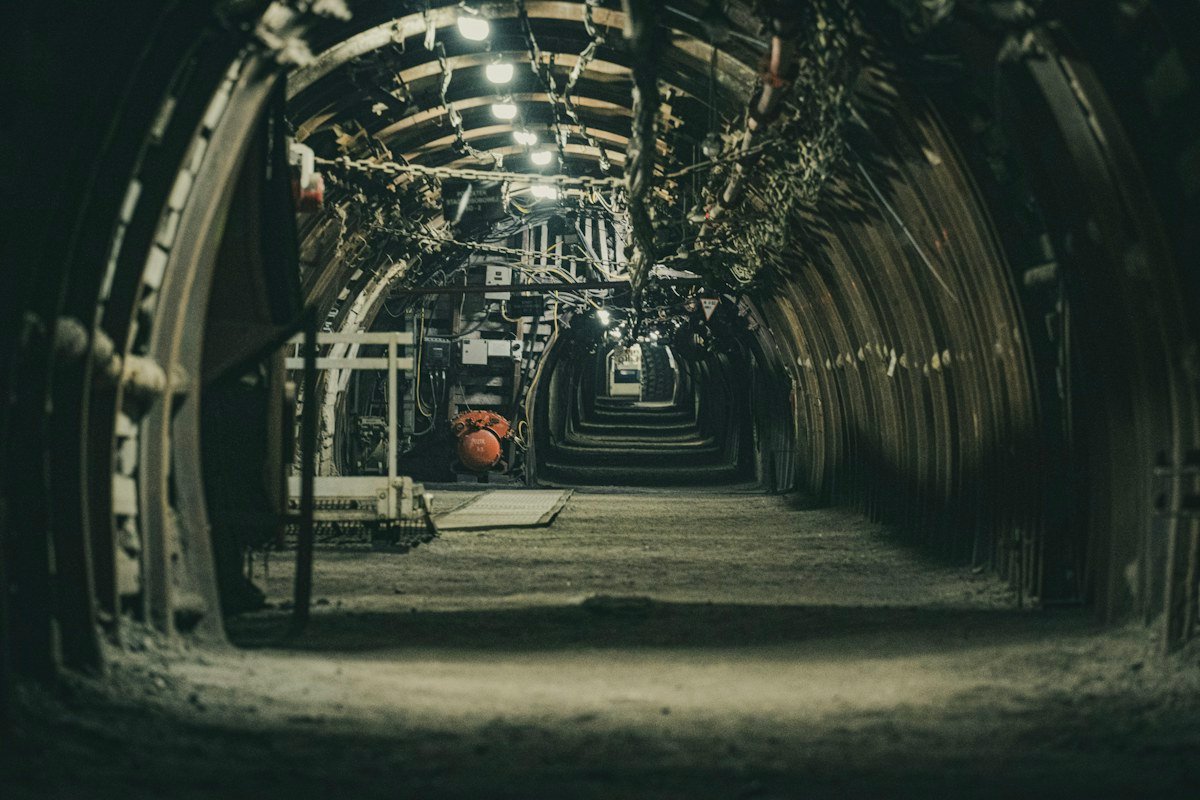 Dark underground tunnel representing survival-horror level design